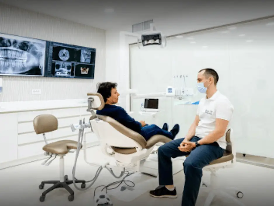 Doctors talking to patient zygomatic