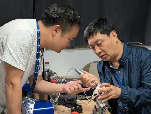 Participant practicing zygomatic implant technique under faculty supervision at the ZAGA Cadaver Course Barcelona 2026