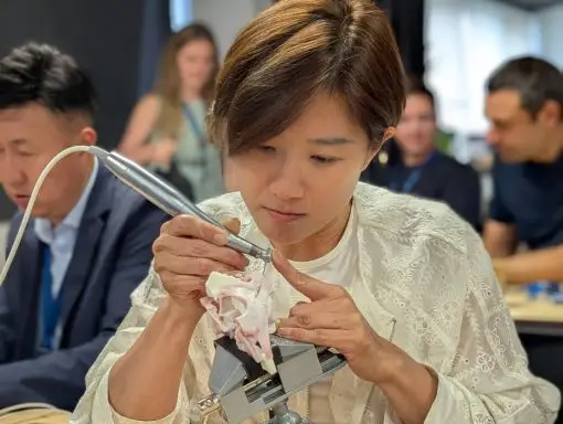 Participant practicing zygomatic implant placement on a 3D model during the ZAGA Course Barcelona June 2026