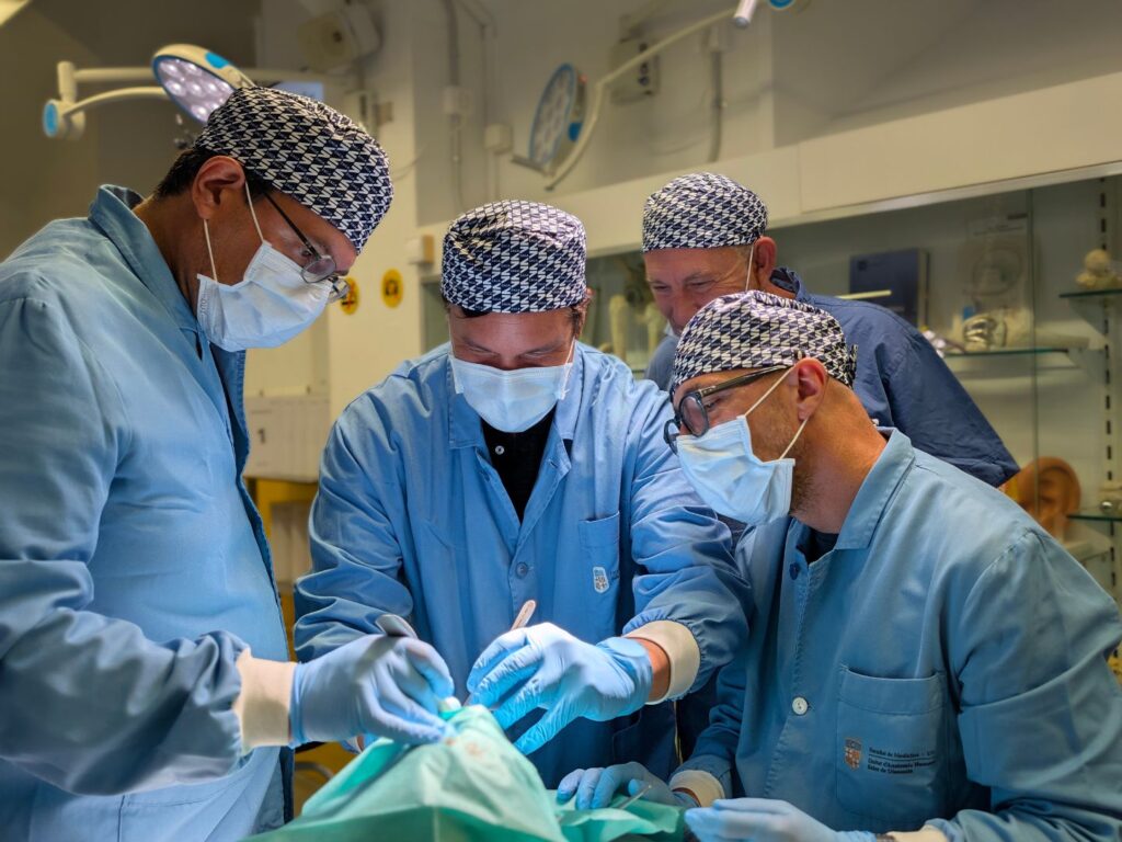 Dr. Vadimir and Dr. Lorean with the participants during the cadaver session